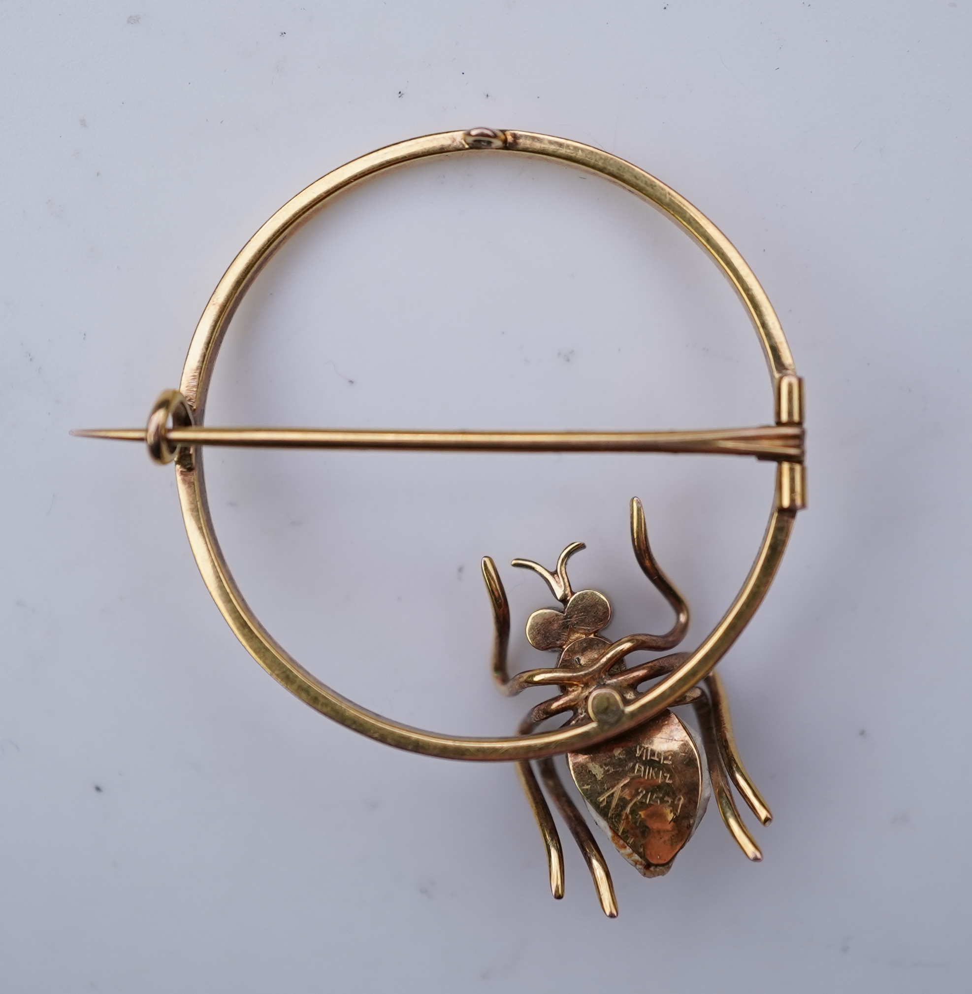 A n Edwardian gold pearl and peridot novelty brooch, early 20th century